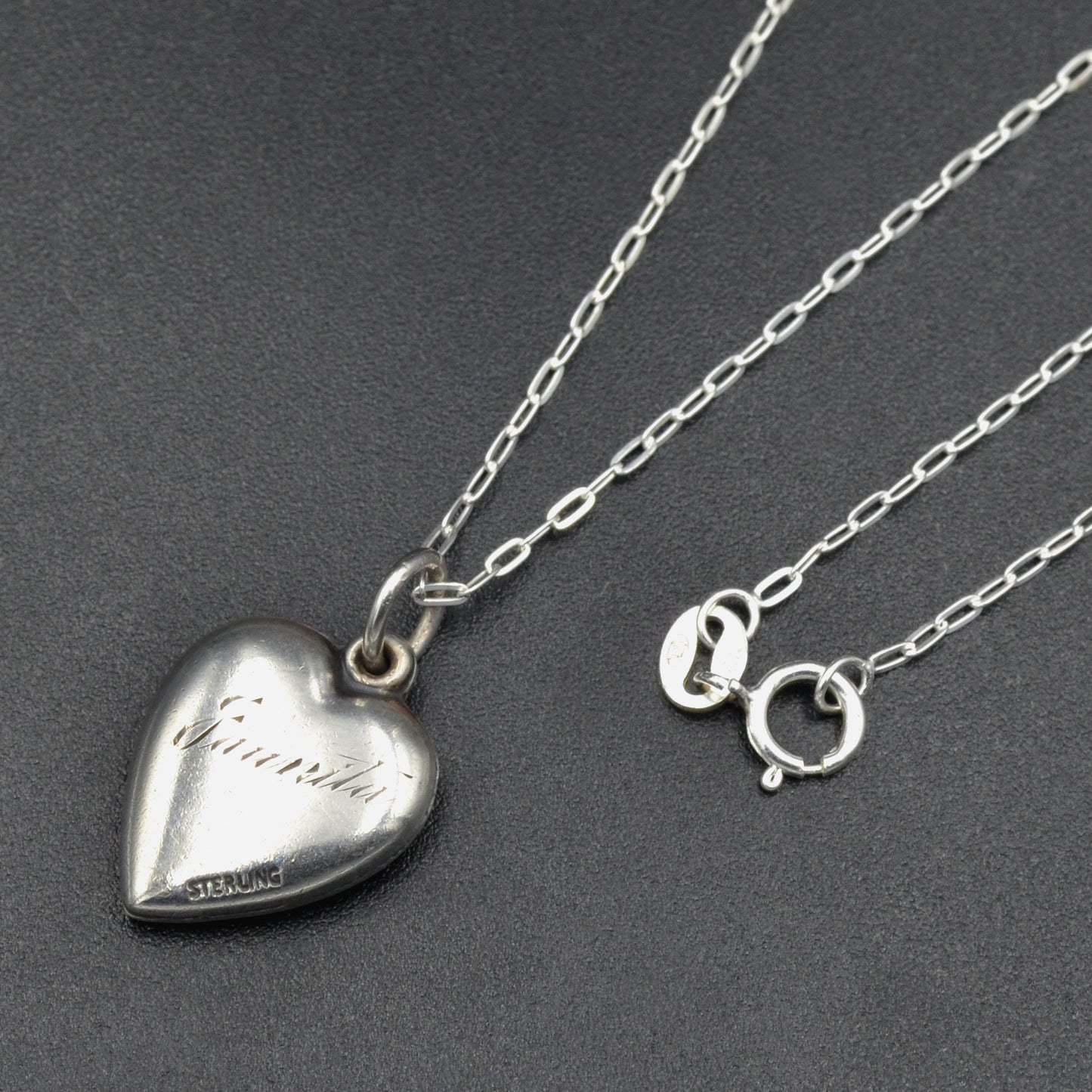 Vintage Silver Repoussé Cupid Heart Necklace