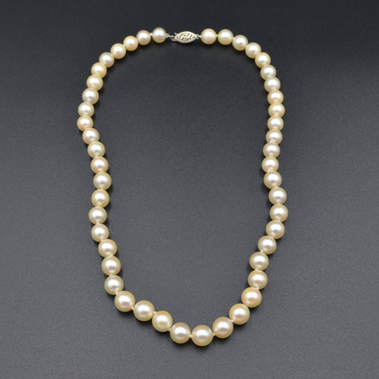 Vintage 14k Gold and Knotted Pink Pearl Necklace