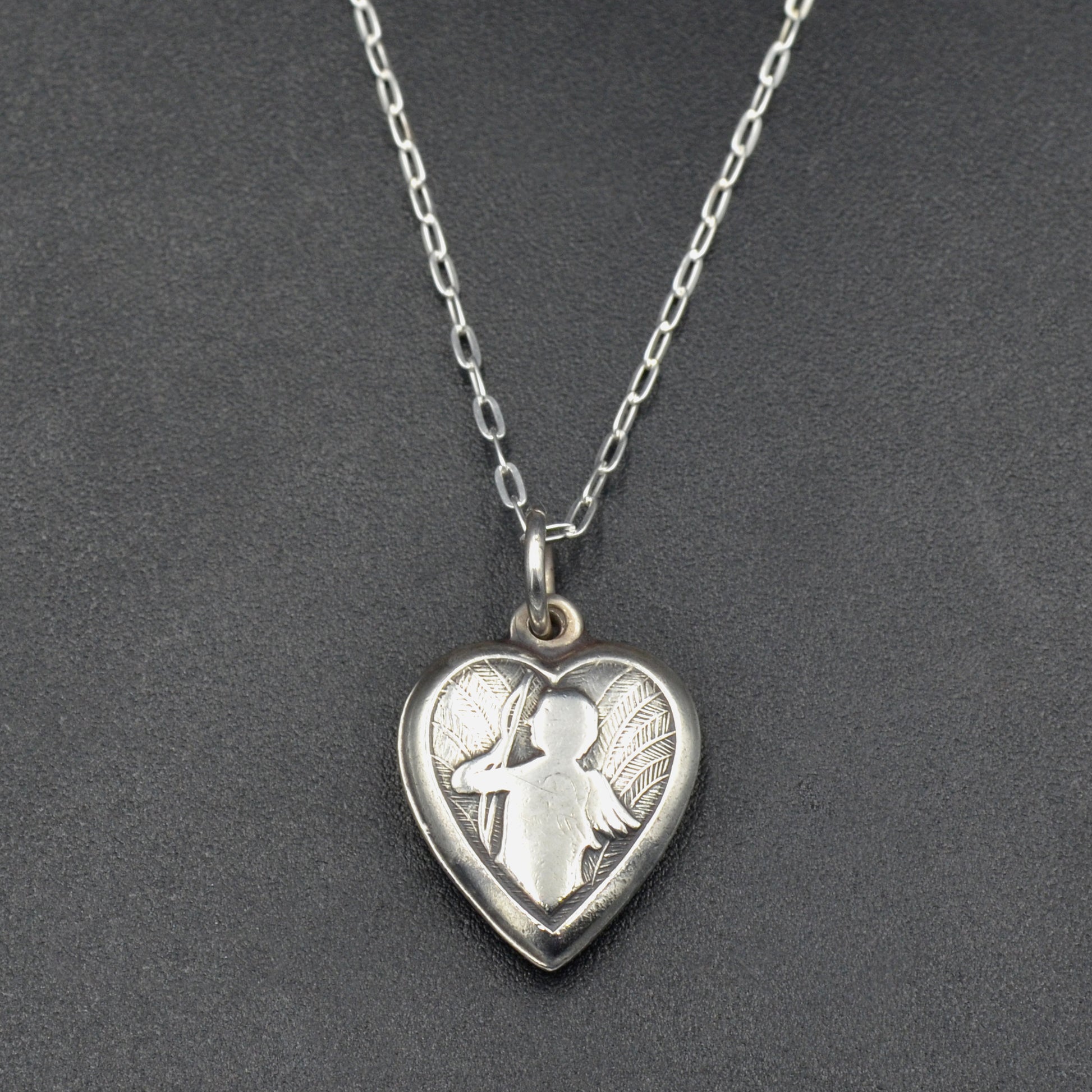 Vintage Silver Repoussé Cupid Heart Necklace